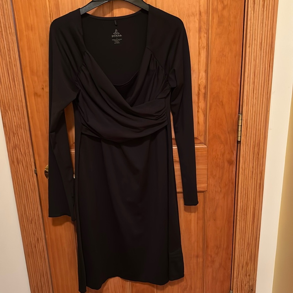 Black dress by Prana in size L. Wrap front.
